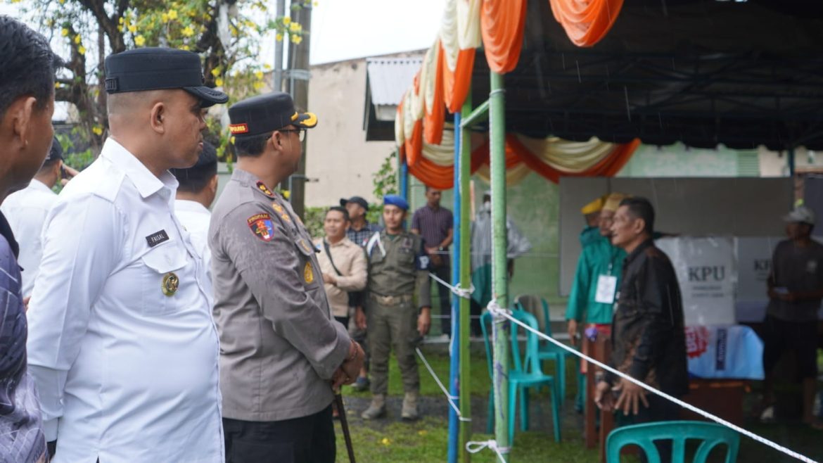 PJ. Bupati Langkat dan Kapolres Pantau TPS di Stabat: Pastikan Pemilu 2024 Berjalan Kondusif.