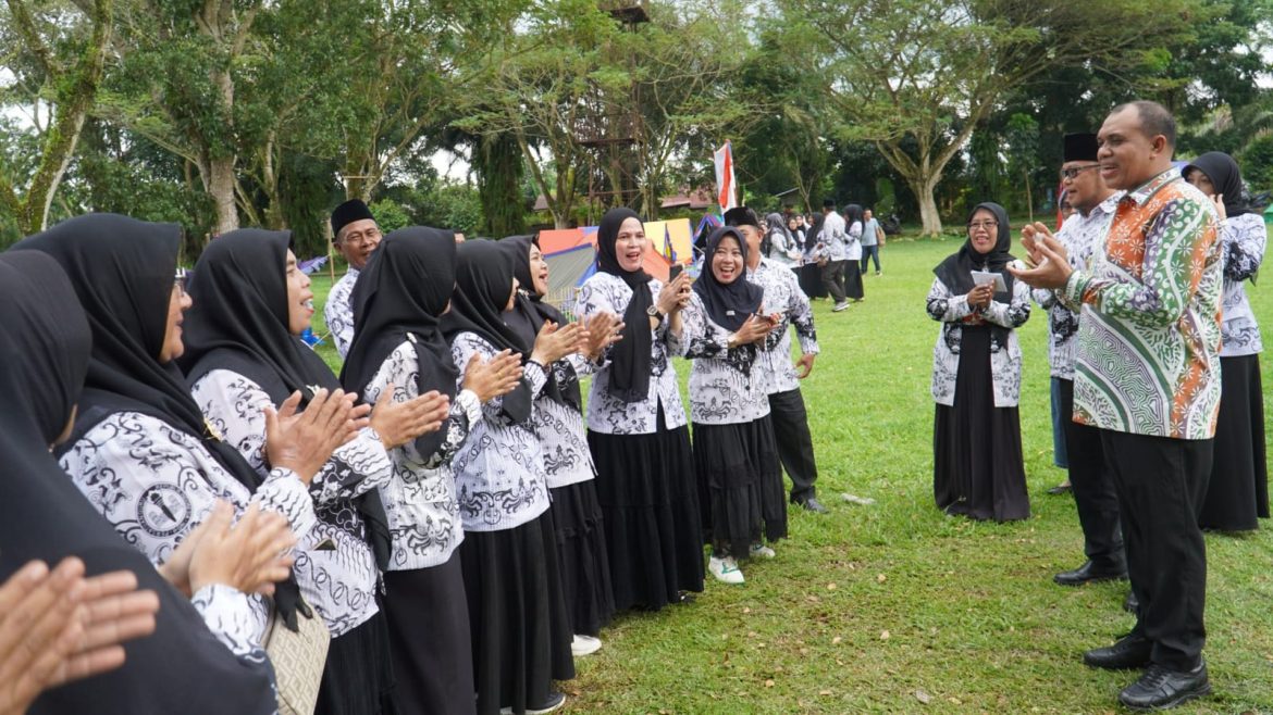 Pj. Bupati Langkat Buka Kemah Bakti Perempuan PGRI: Dorong Langkat Pintar Menuju Indonesia Emas 2045.