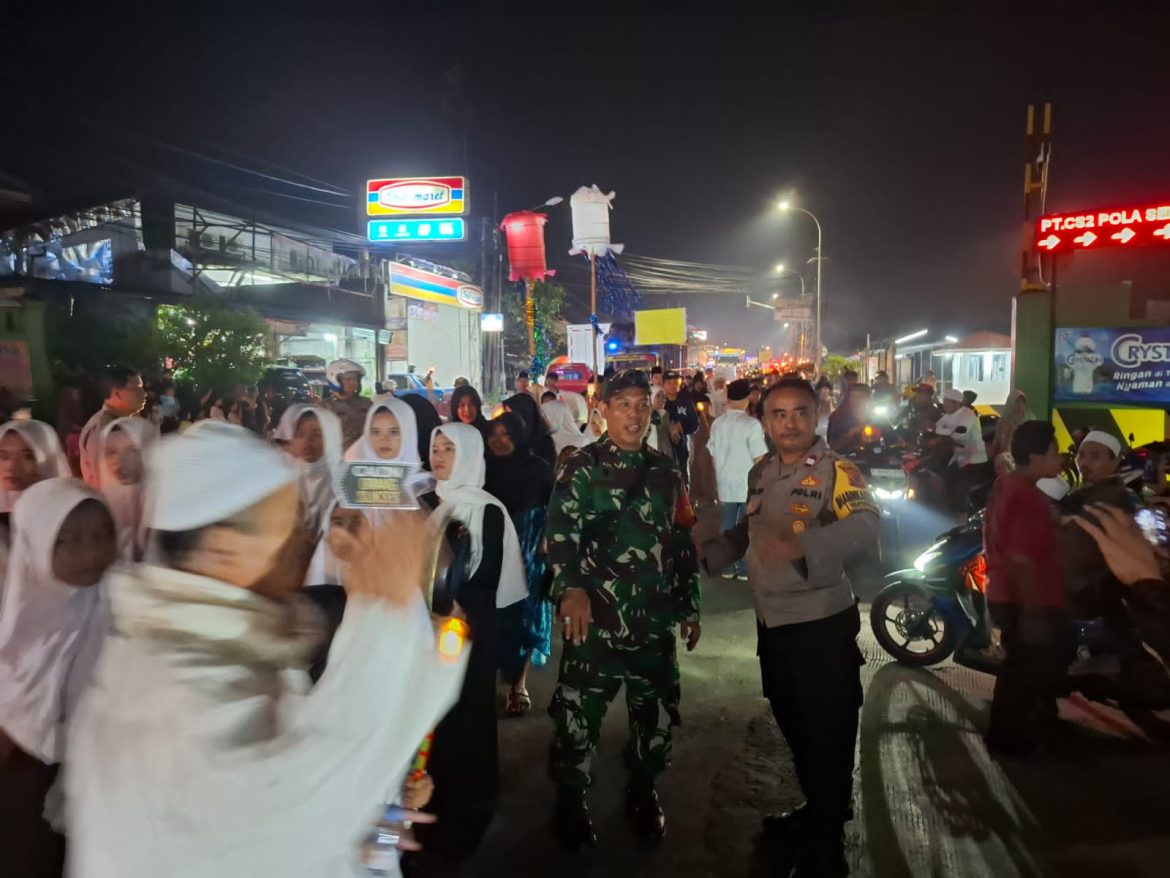 Polsek Caringin Laksanakan Pengamanan Pengawalan dan Pengaturan Lalin Saat Pawai Obor 1447 H   