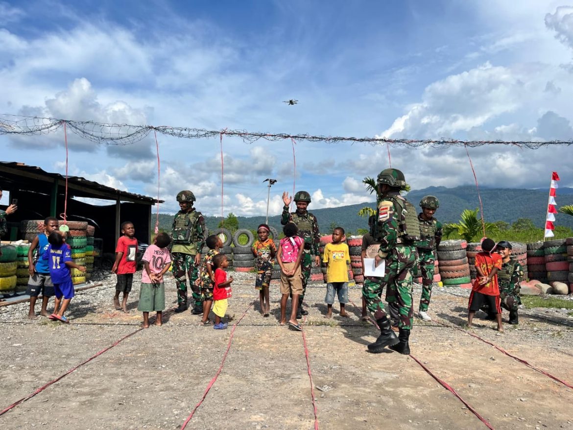 Satgas Yonif 521/DY Melaksanakan Kegiatan Lomba Dalam Rangka Memperingati Hari Kemerdekaan Republik Indonesia yang ke-80 di Distrik Elelim   