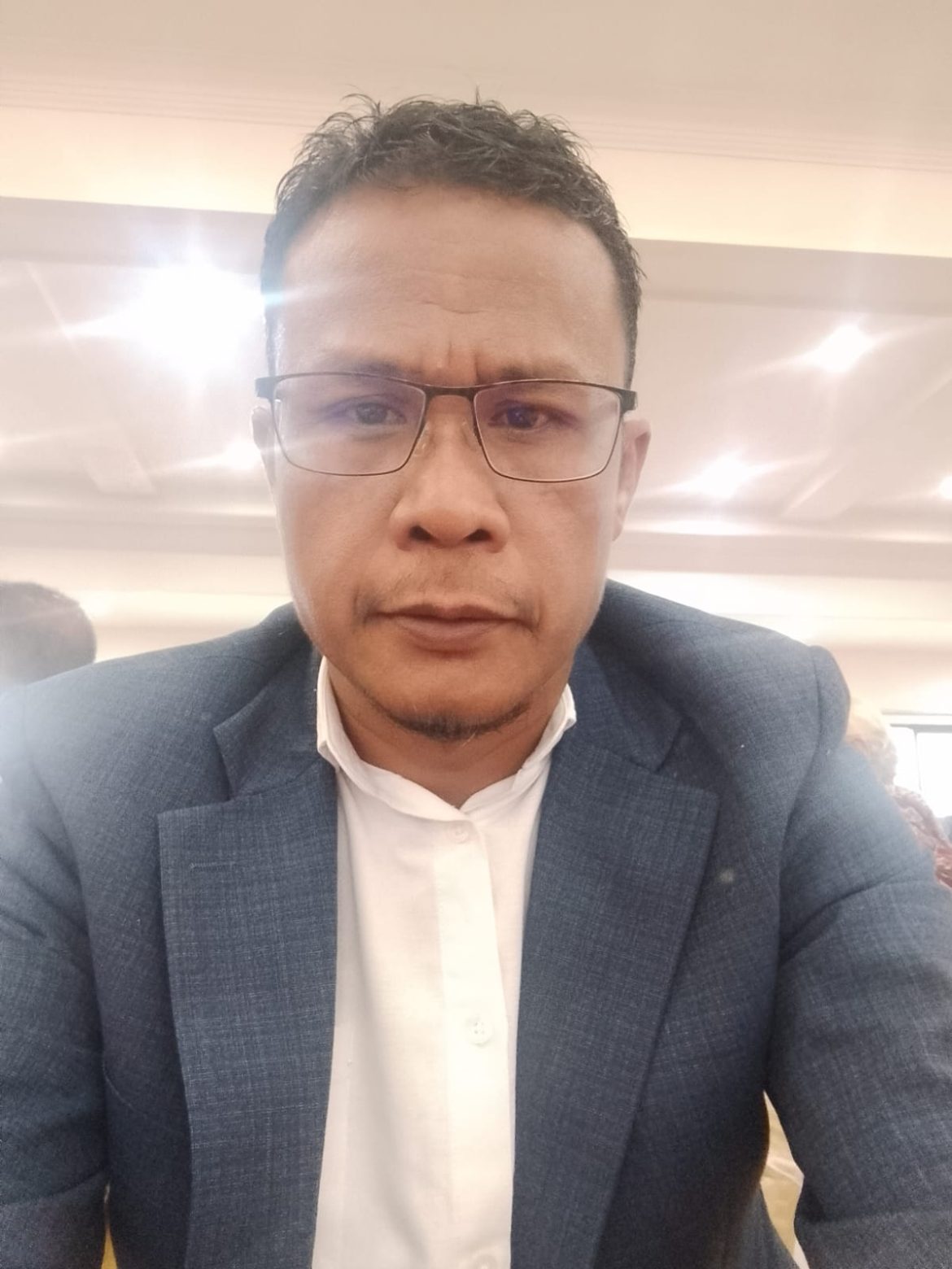 “Jonny Simanullang. SH, Divisi Hukum DPC FRIC BOGOR RAYA sedang Merayakan Natal 